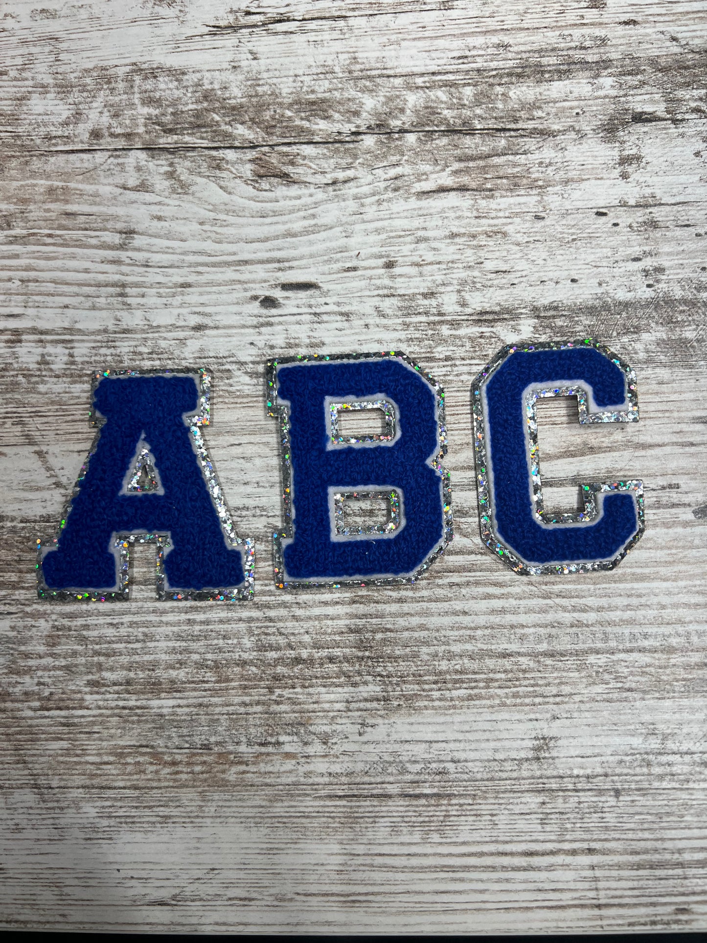 Silver Outline Blue Letters - Iron On Patch